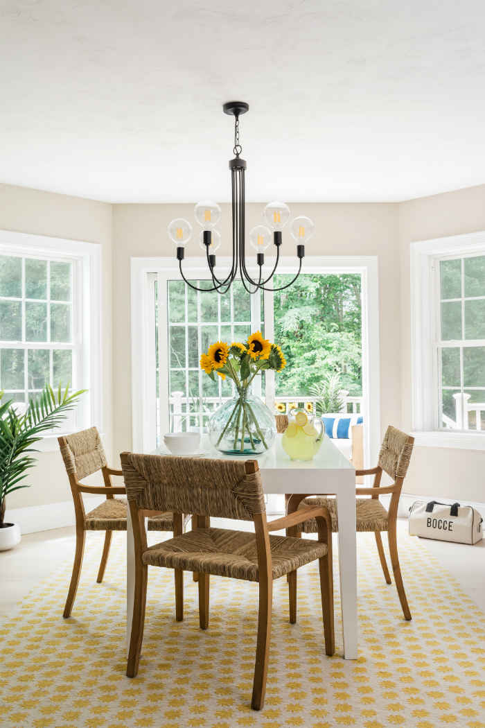 Beautiful White Dinette With Yellow Area Rug