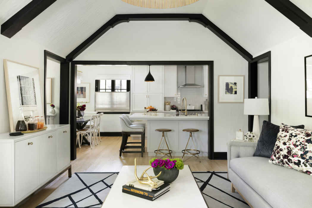 White Living Room With Vaulted Ceilings